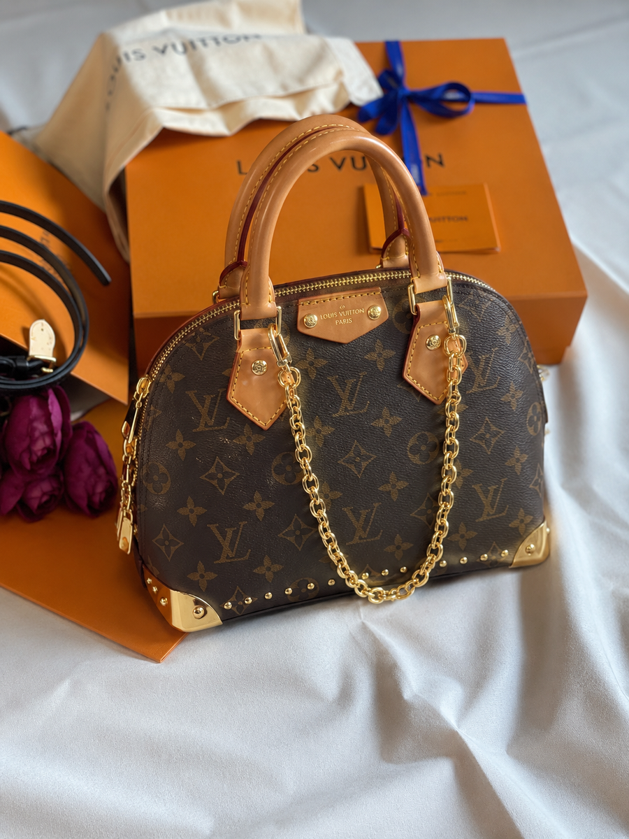 LV ALMA TACHES