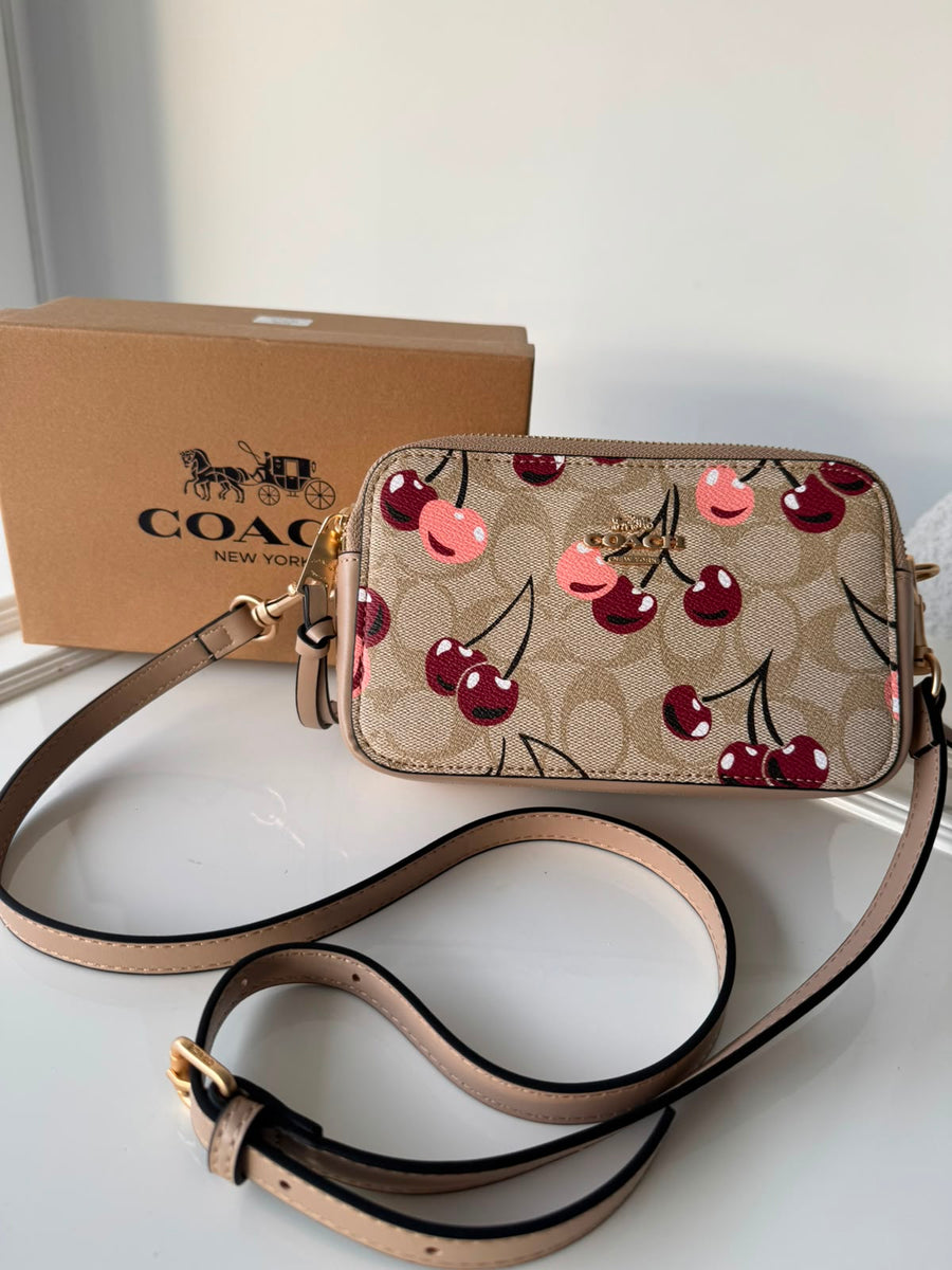 MANOS LIBRES COACH GLAM