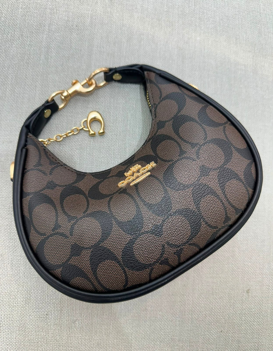 COACH BELLE CURVE
